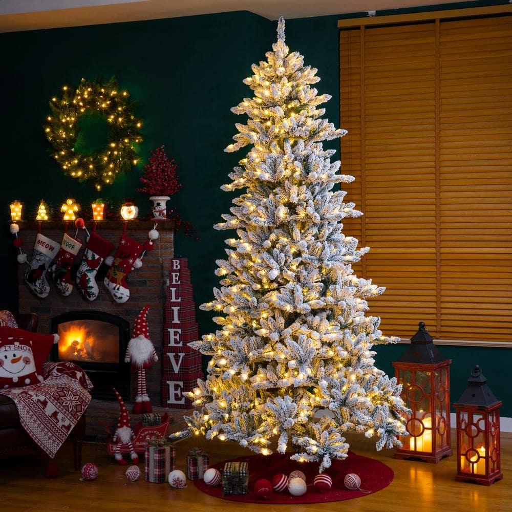 9 ft. Pre-Lit Snow Flocked Fir Artificial Christmas Tree with 650 Warm White Lights