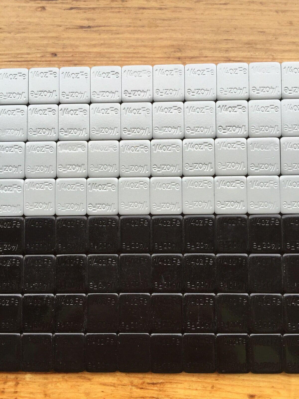 27 LBS BLACK WHEEL WEIGHTS-1/4 OZ -27 LBS GREY- 1/4 OZ. STICK-ON ADHESIVE TAPE