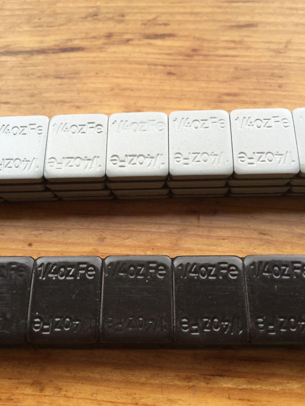 27 LBS BLACK WHEEL WEIGHTS-1/4 OZ -27 LBS GREY- 1/4 OZ. STICK-ON ADHESIVE TAPE