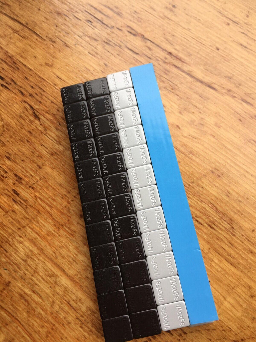 27 LBS BLACK WHEEL WEIGHTS-1/4 OZ -27 LBS GREY- 1/4 OZ. STICK-ON ADHESIVE TAPE