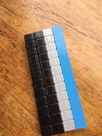 27 LBS BLACK WHEEL WEIGHTS-1/4 OZ -27 LBS GREY- 1/4 OZ. STICK-ON ADHESIVE TAPE