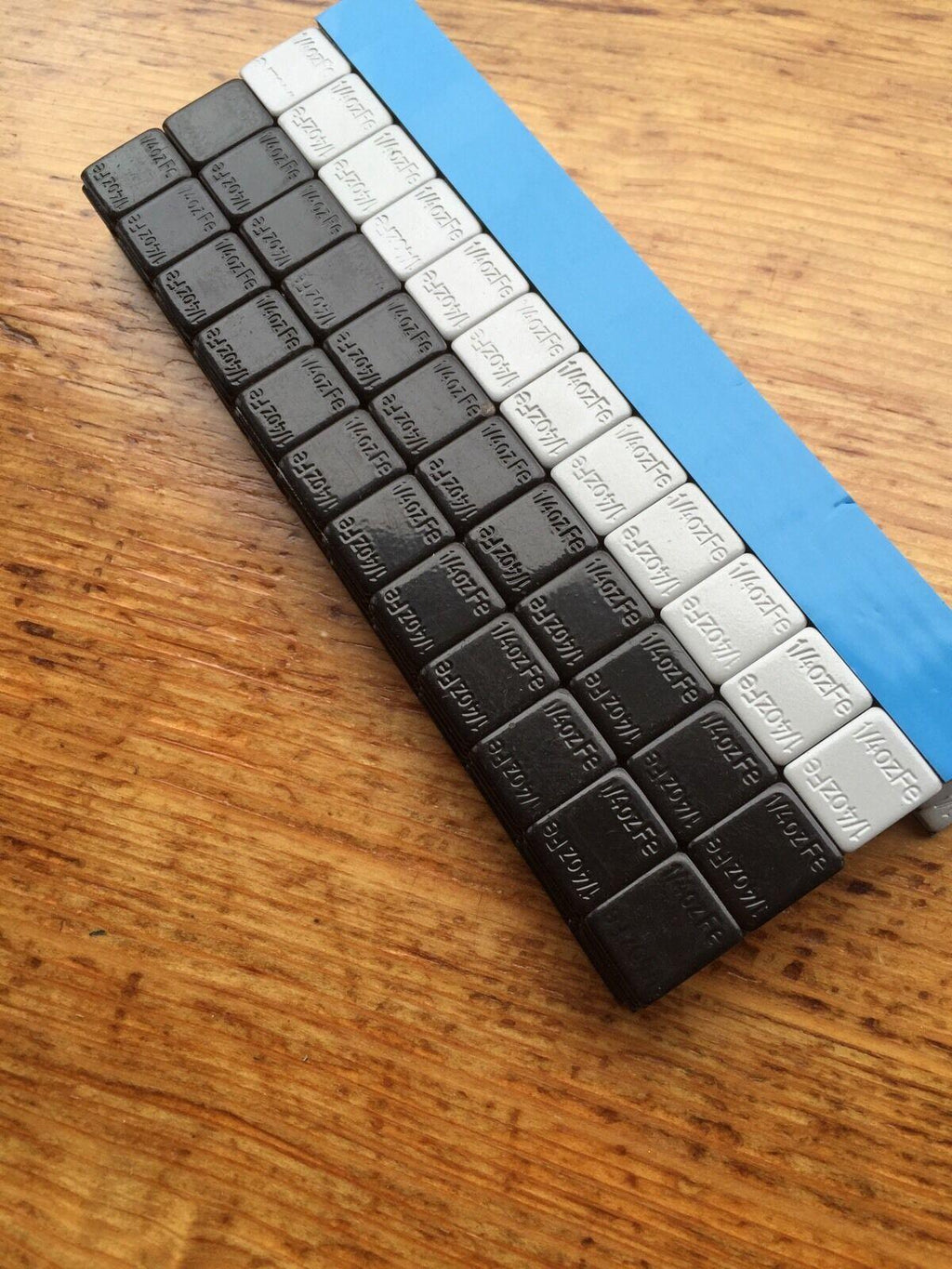 27 LBS BLACK WHEEL WEIGHTS-1/4 OZ -27 LBS GREY- 1/4 OZ. STICK-ON ADHESIVE TAPE