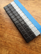 27 LBS BLACK WHEEL WEIGHTS-1/4 OZ -27 LBS GREY- 1/4 OZ. STICK-ON ADHESIVE TAPE