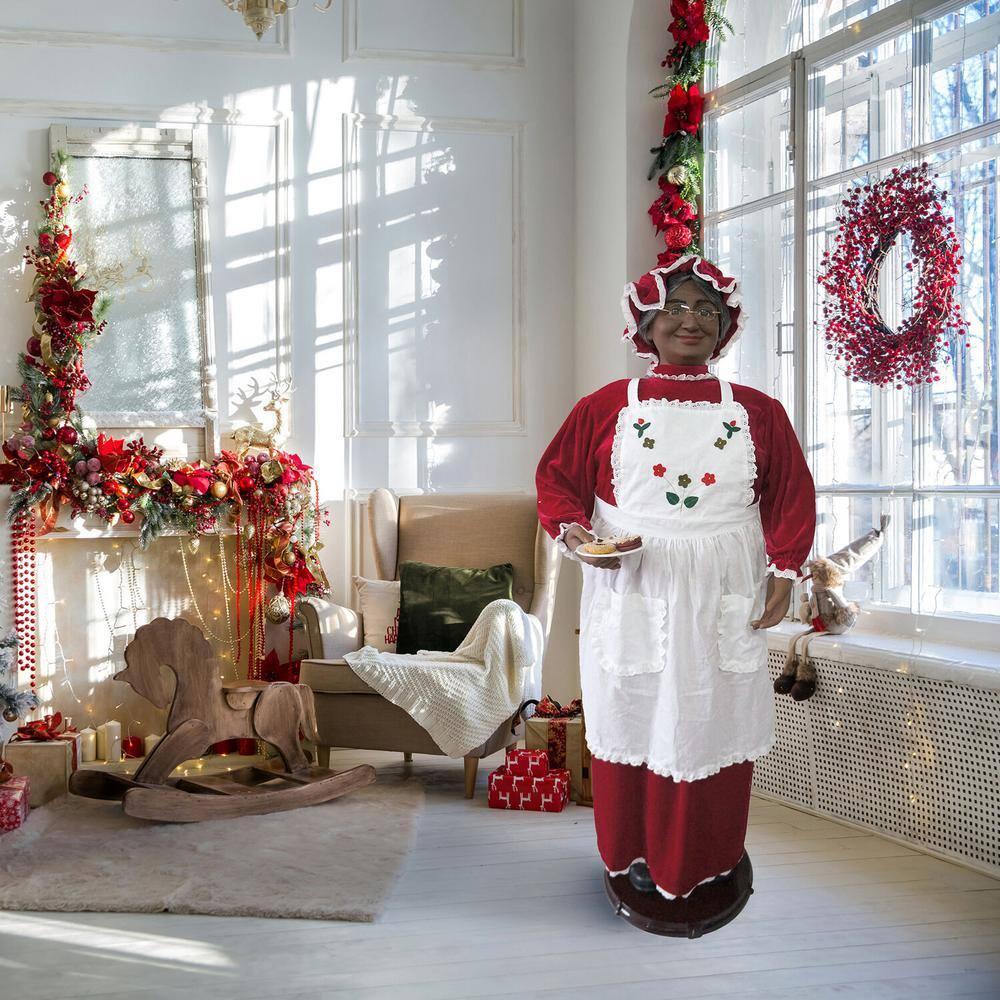 58 in. Dancing Christmas African American Mrs. Claus with Apron and Cookies