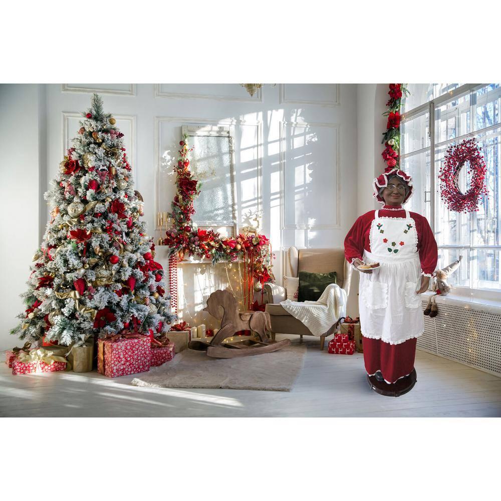 58 in. Dancing Christmas African American Mrs. Claus with Apron and Cookies