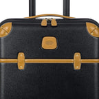 Bellagio 2.0 Spinner Trunk with Pocket - 21" Carry On Suitcase - TSA Approved Luggage - Black