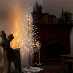 65 in. H Indoor/Outdoor Pre-Lit Silver Foil Christmas Tree with Yard Stake and 360 LED Lights