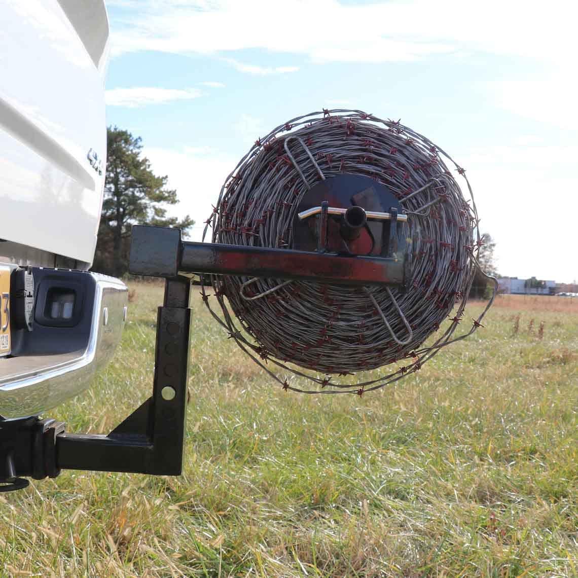 titan distributors inc. barbed wire unroller bolt on atv or 2" receiver hitch compatible and for fencing