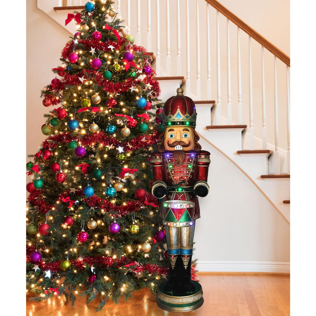 Fraser Hill Farm Indoor/Outdoor Oversized Christmas Decor, 5-Ft. Nutcracker Playing Snare Drum w/Moving Hands, Music, Timer, and 20 LED Lights
