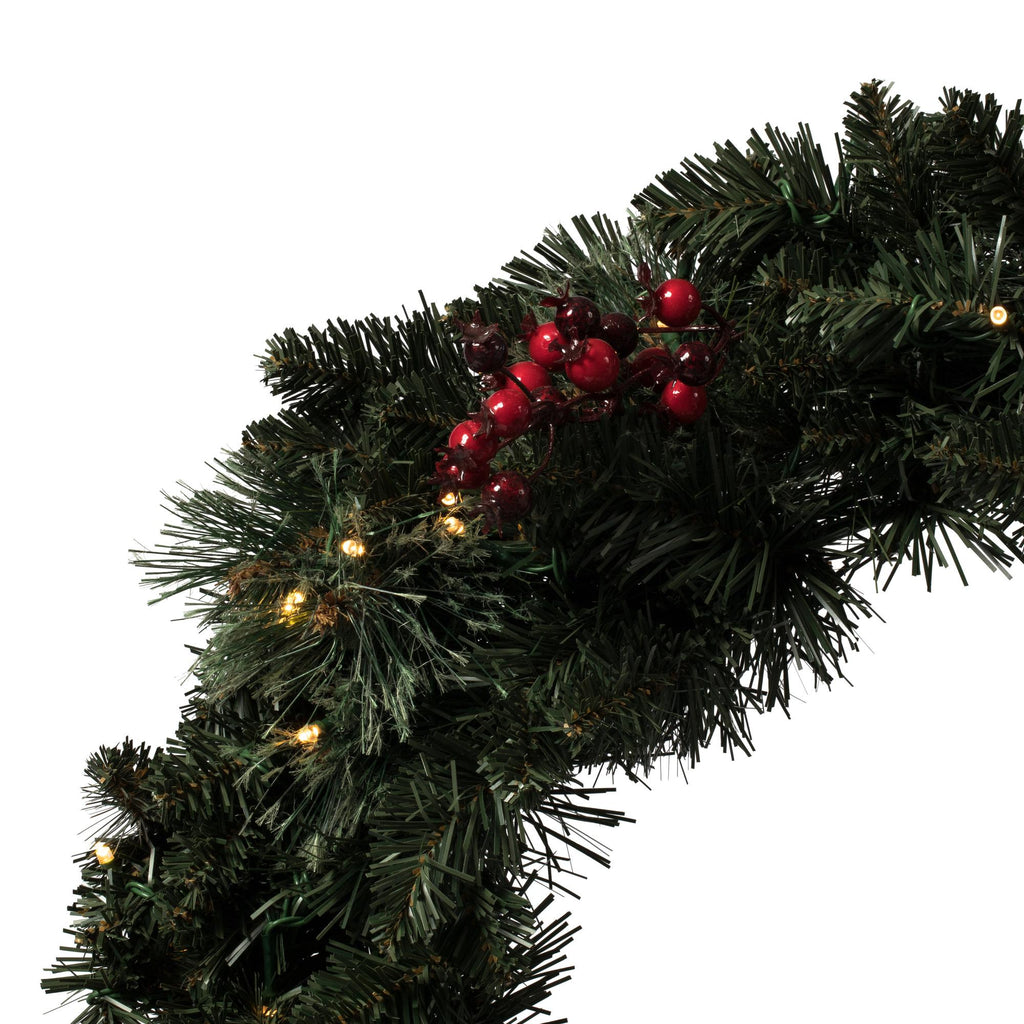 with 200 Battery Operated Warm White 3MM LED lights. Includes two 3.5' Potted Trees, one 30" Wreath and one 9' Garland. This incredible set features battery operated Warm White LED lights, pine cone