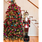 Fraser Hill Farm Indoor/Outdoor Oversized Christmas Decor, 6-Ft. Jeweled Nutcracker Greeter with Staff and 22 Long-Lasting LED Lights