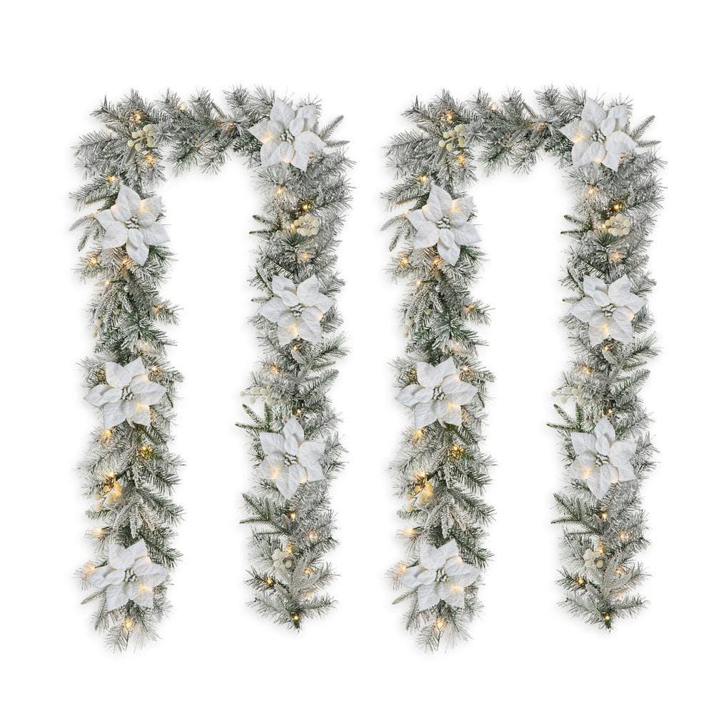 2-Pack 9 ft. Pre-Lit Snow Flocked Greenery Pine Poinsettia Artificial Christmas Garland, with 50 White Lights with Timer