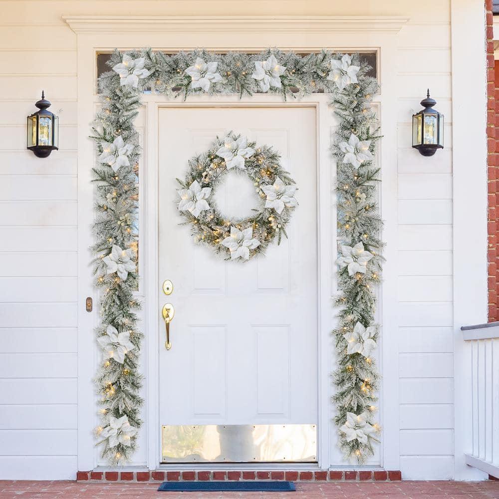 2-Pack 9 ft. Pre-Lit Snow Flocked Greenery Pine Poinsettia Artificial Christmas Garland, with 50 White Lights with Timer