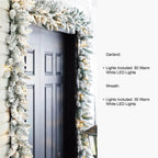 2-Pack 9 ft. Pre-lit LED Artificial Christmas Garland and 24 in. D Pre-Lit Snow Flocked Christmas Wreath Set