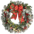 24 in. General Store Snowy Artificial Christmas Wreath with LED Lights and Bow
