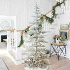 9 ft. Deluxe Pre-Lit Flocked Pine Artificial Christmas Tree with 650 Warm White Lights