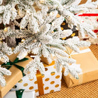 9 ft. Deluxe Pre-Lit Flocked Pine Artificial Christmas Tree with 650 Warm White Lights