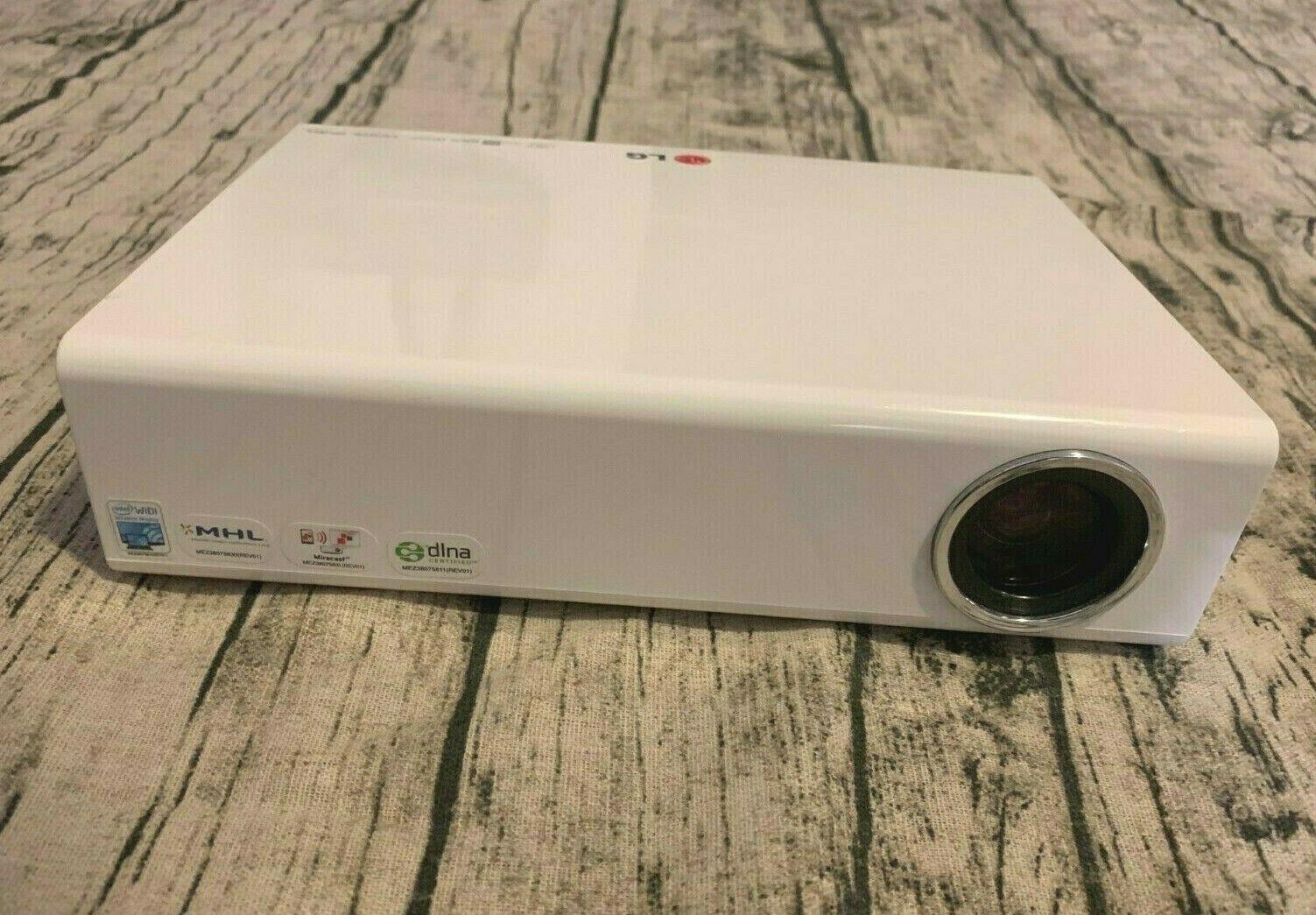 pre-owned lg pa77u portable led projector with smart tv and magic remote