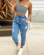 solid color drawstring elasticized waist ripped jeans