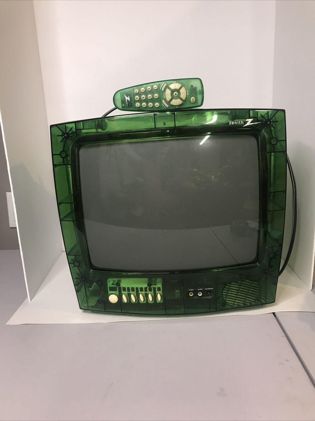 zenith c13a04lg transparent green 13" inch color prison tv, has remote. 2000