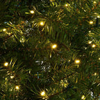 8 ft. Pre-Lit Dense PVC Christmas Tree Spruce Hinged with 880 LED Lights and Stand