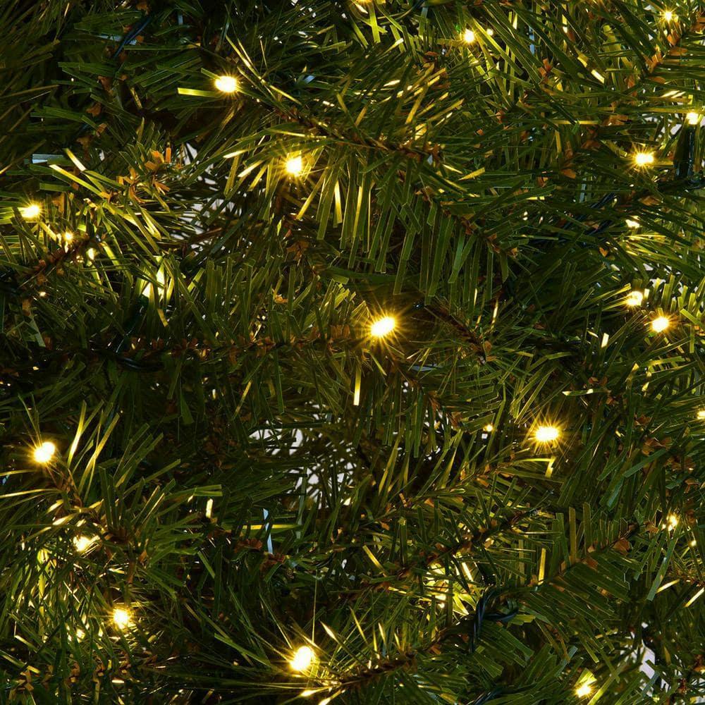 8 ft. Pre-Lit Dense PVC Christmas Tree Spruce Hinged with 880 LED Lights and Stand