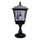 25" Snowman With a Broom and Toys Snowing Black Christmas Street Lamp