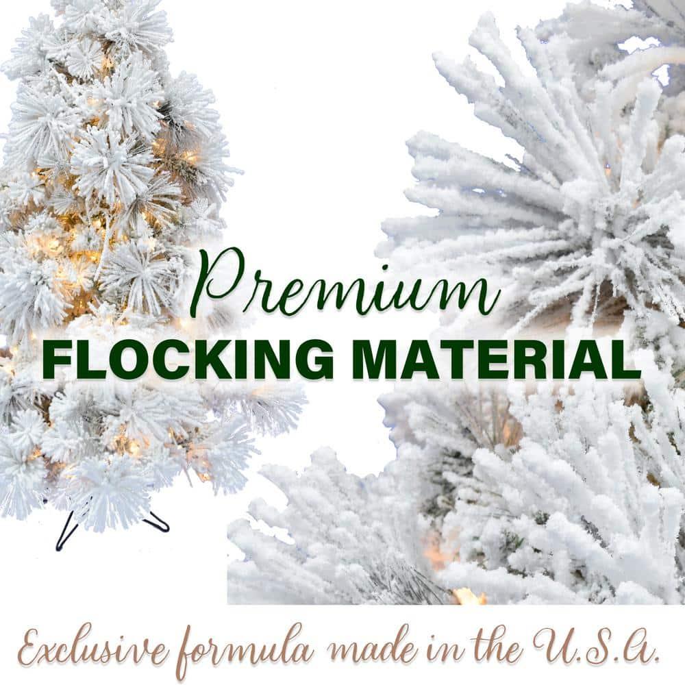 12 ft. Pre-lit LED Flocked Snowy Pine Artificial Christmas Tree with 1400 Clear String Lights