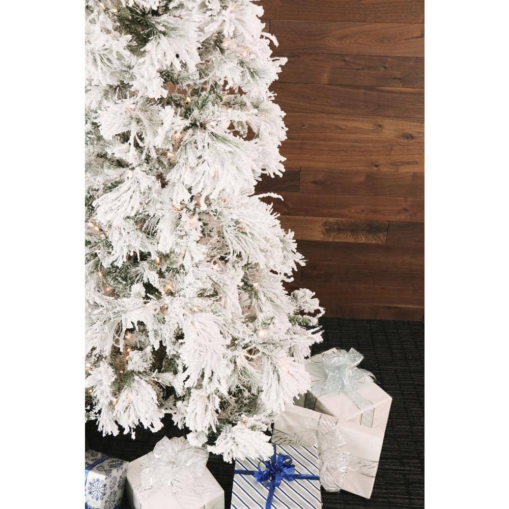 12 ft. Pre-lit LED Flocked Snowy Pine Artificial Christmas Tree with 1400 Clear String Lights