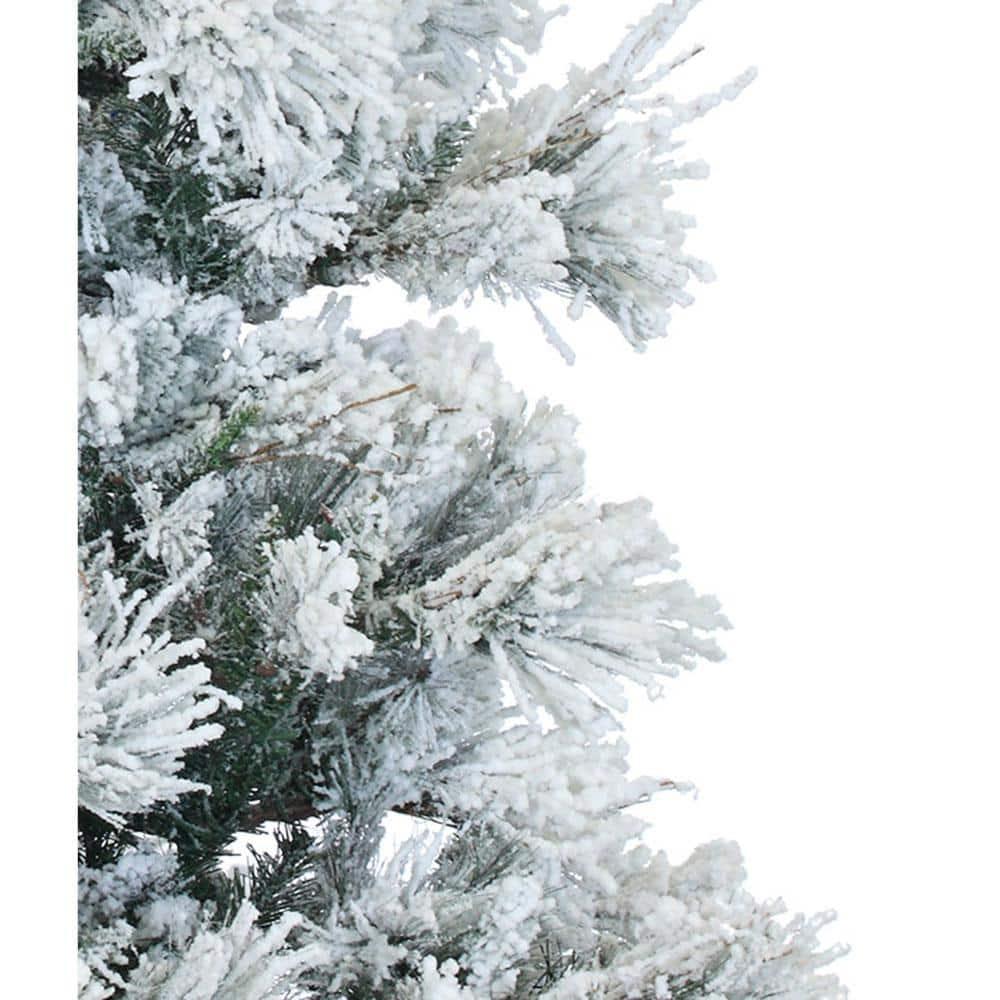 12 ft. Pre-lit LED Flocked Snowy Pine Artificial Christmas Tree with 1400 Clear String Lights