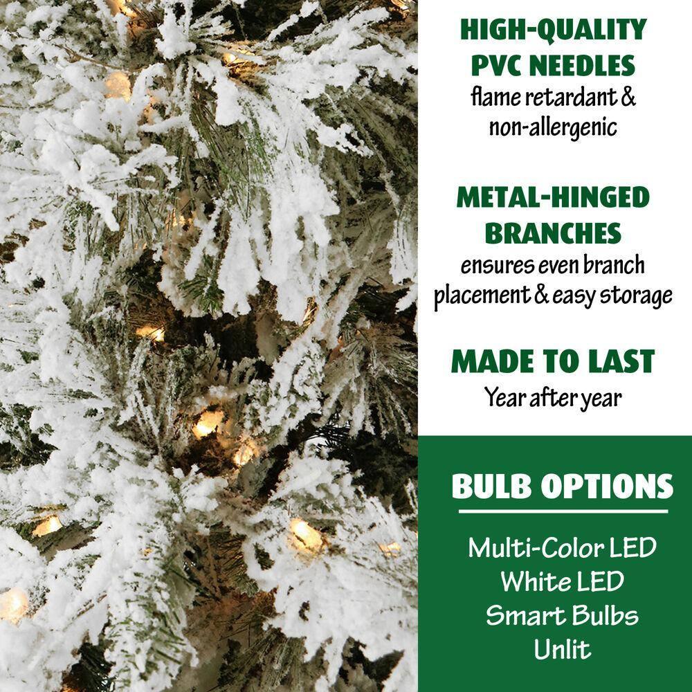 12 ft. Pre-lit LED Flocked Snowy Pine Artificial Christmas Tree with 1400 Clear String Lights