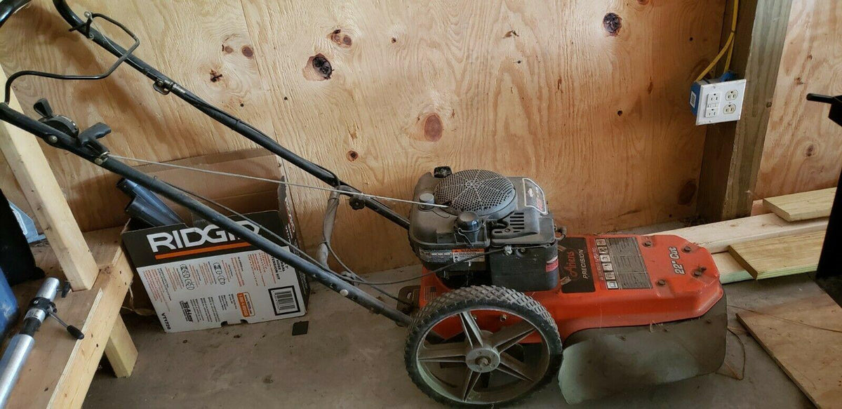 tuCArien Precision trim walk behind string mower 6.25 and Stratton motor