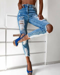 zipper fly slant pocket ripped raw hem skinny jeans