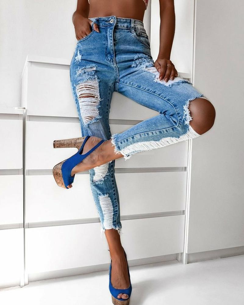 zipper fly slant pocket ripped raw hem skinny jeans