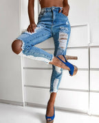 zipper fly slant pocket ripped raw hem skinny jeans