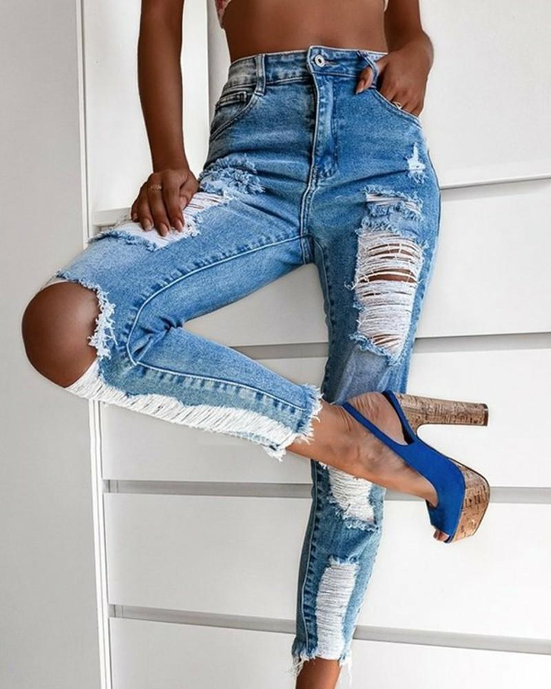 zipper fly slant pocket ripped raw hem skinny jeans