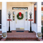 69 in. Black Christmas Musical Snow Globe Lamp Post with Santa Scene, 2 Signs, Cascading Snow and Christmas Carols