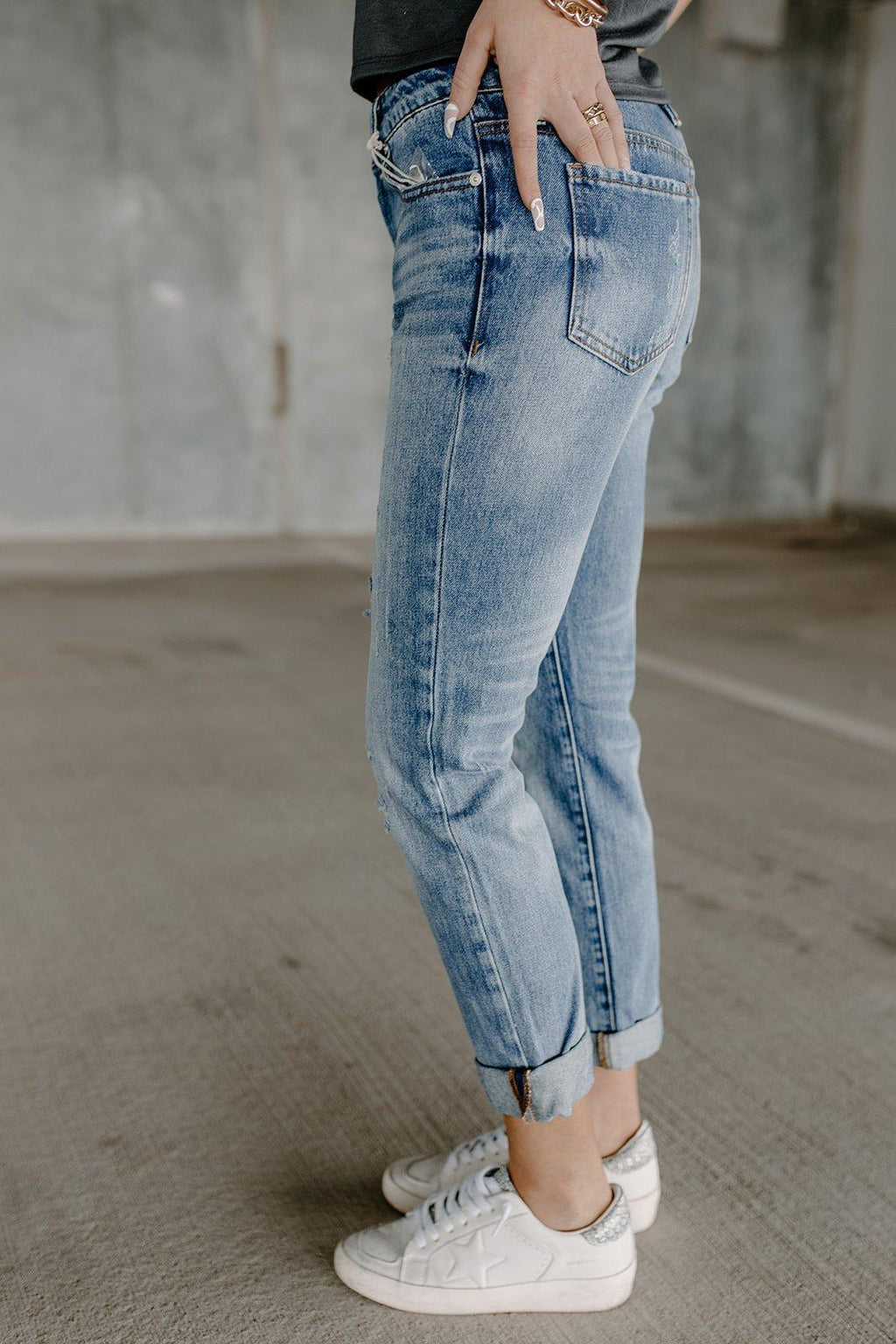 mid rise cuff medium dark denim jeans