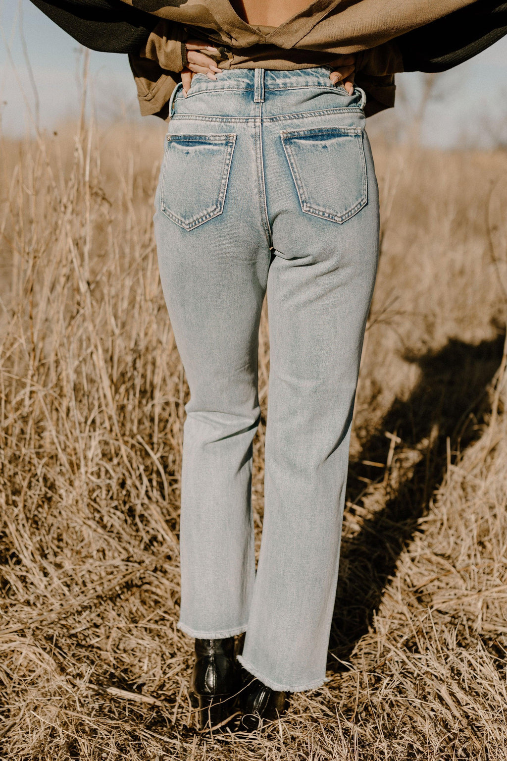 distressed light mom jeans