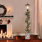 Puleo International Indoor/Outdoor 7 ft. Potted Holiday Lamp Post with Lighted Decorated Garland