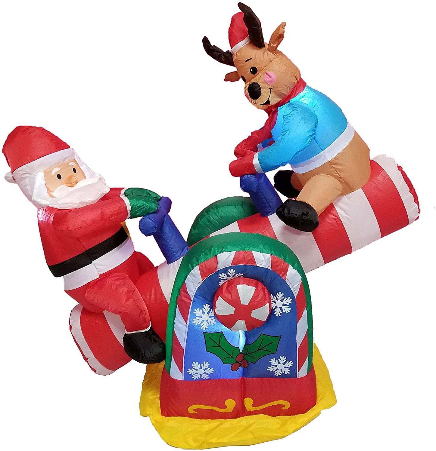 TWO CHRISTMAS PARTY DECORATIONS BUNDLE, Includes 4 Foot Tall Animated Inflatable Santa Claus Reindeer on Teeter Totter, and 9 Foot Long Inflatable Penguin Reindeer Polar Bear Christmas Tree Slide