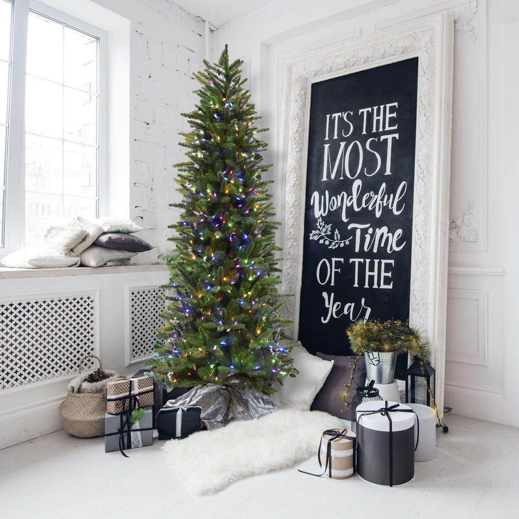 Fraser Hill Farm Multi-color Prelit LED Green Hinged Carmel Pine Slim Artificial Christmas Tree, with String Lighting 9'