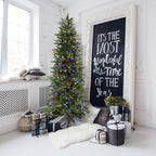 Fraser Hill Farm Multi-color Prelit LED Green Hinged Carmel Pine Slim Artificial Christmas Tree, with String Lighting 9'